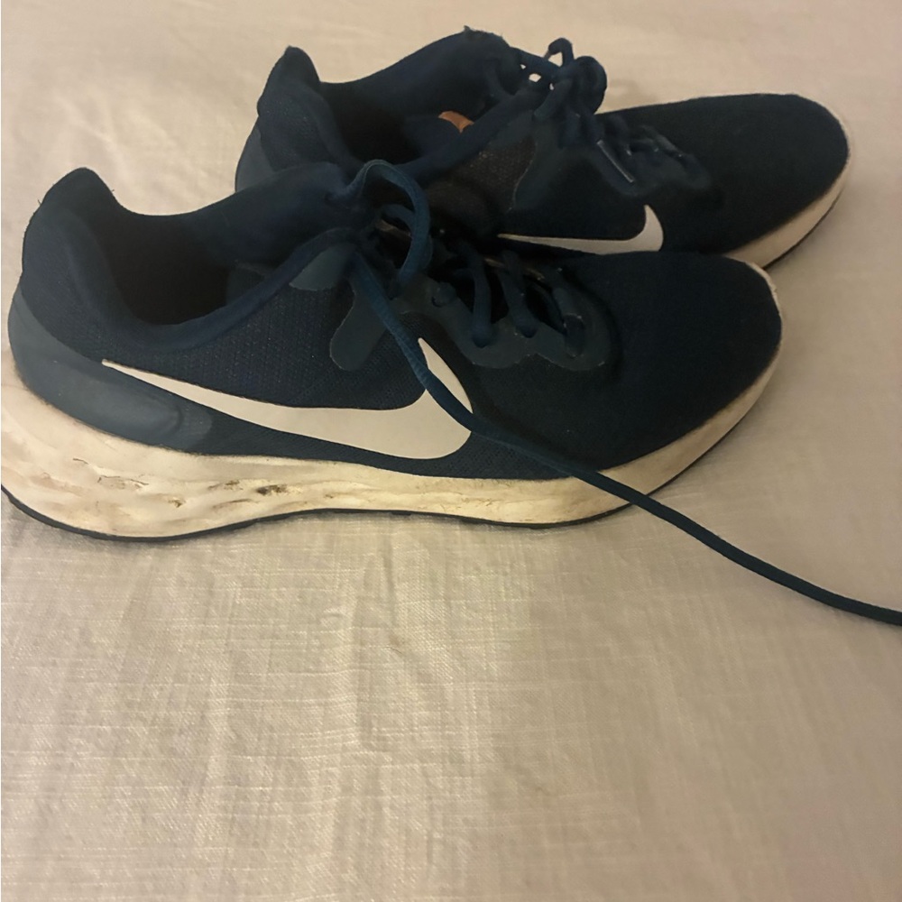 Women’s Nike navy running shoes